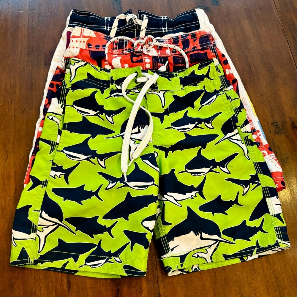 *Bundle* of boys swim trunks, three pairs, sizes (S) 5-6.